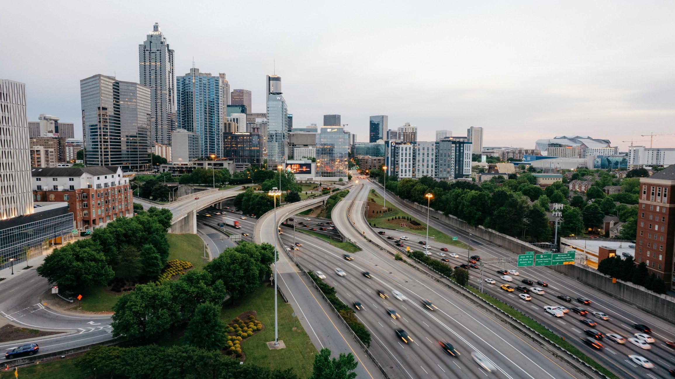 Downtown city skyline and highway traffic