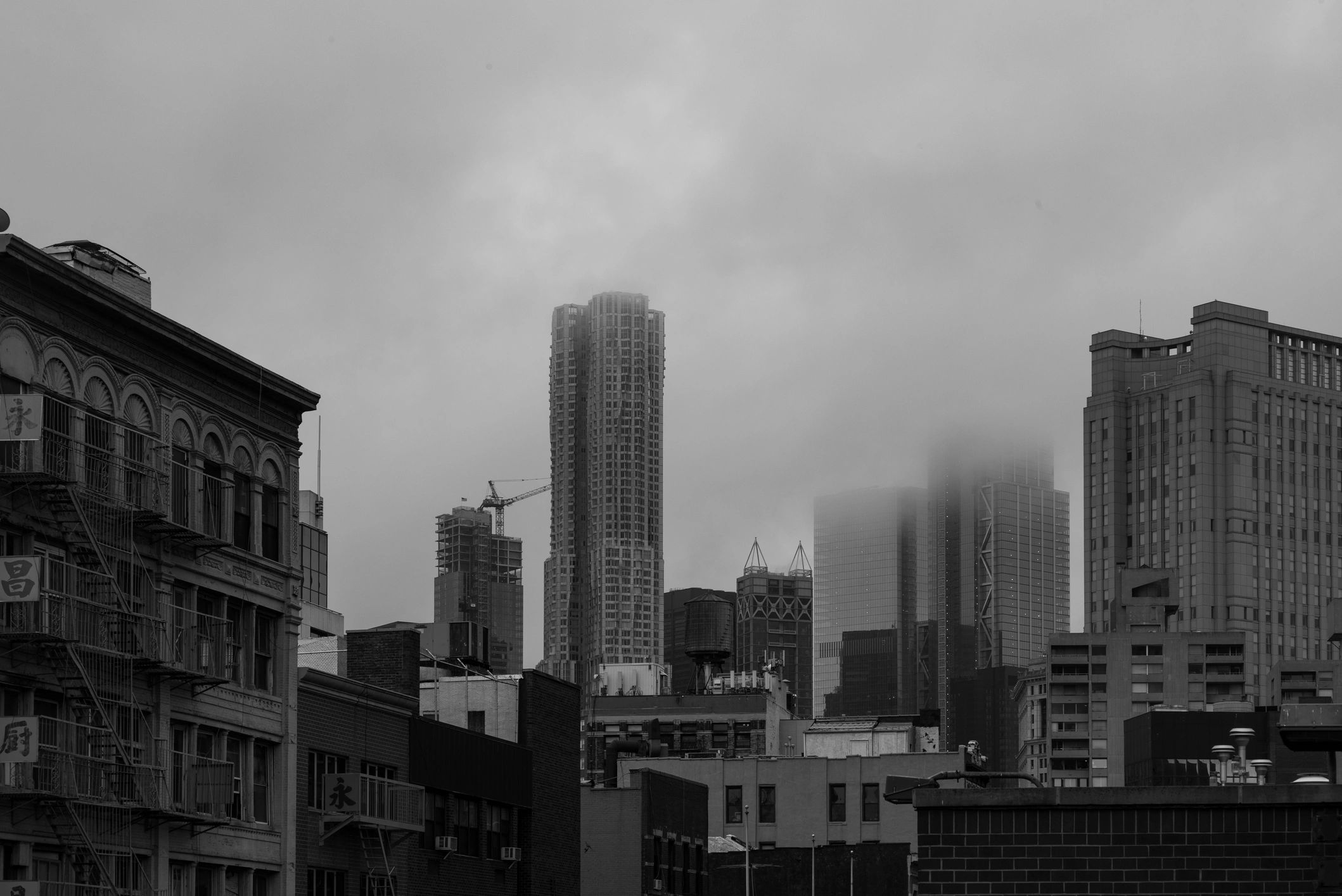 Fog over New York buildings in black and white