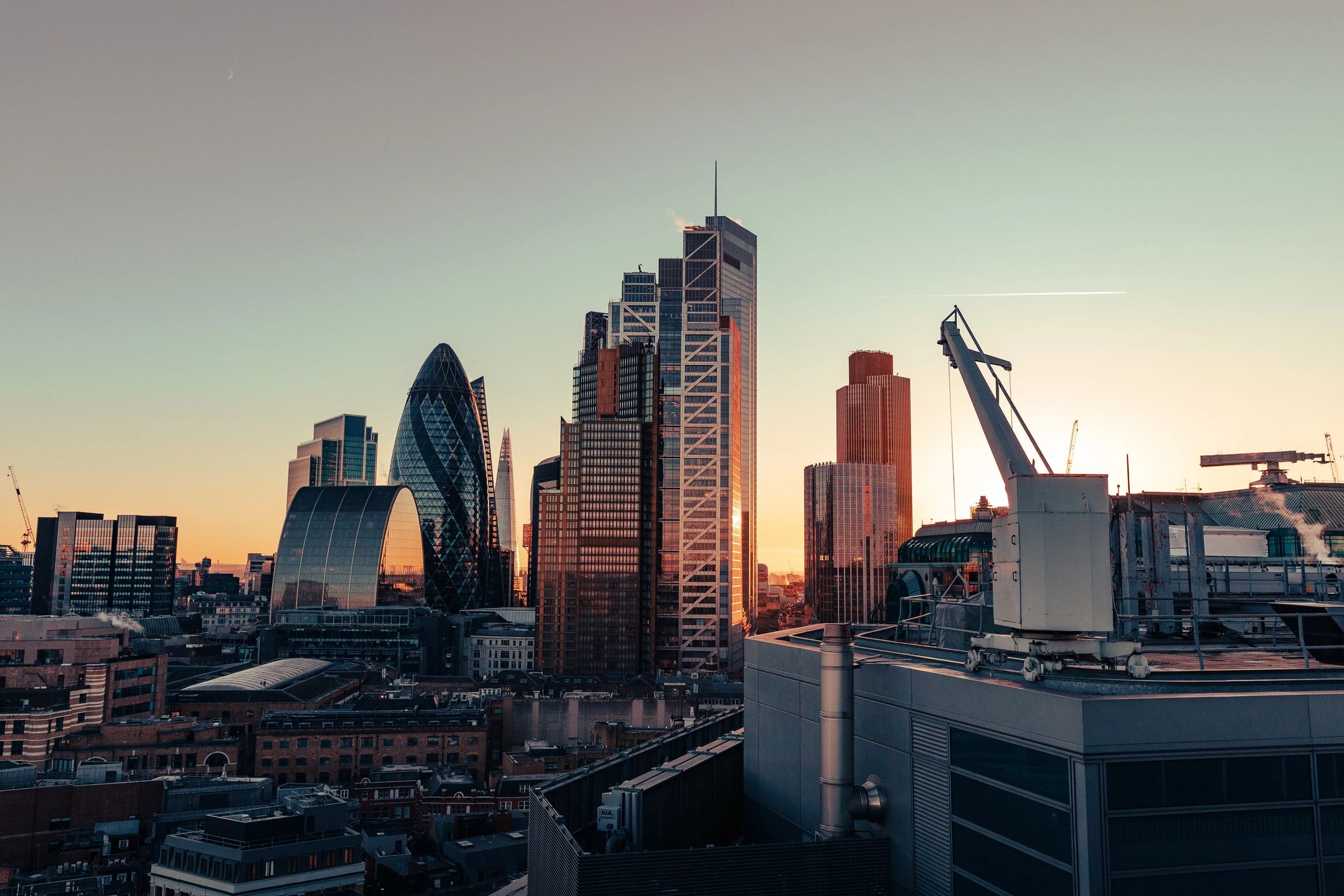 Sun setting over iconic London buildings