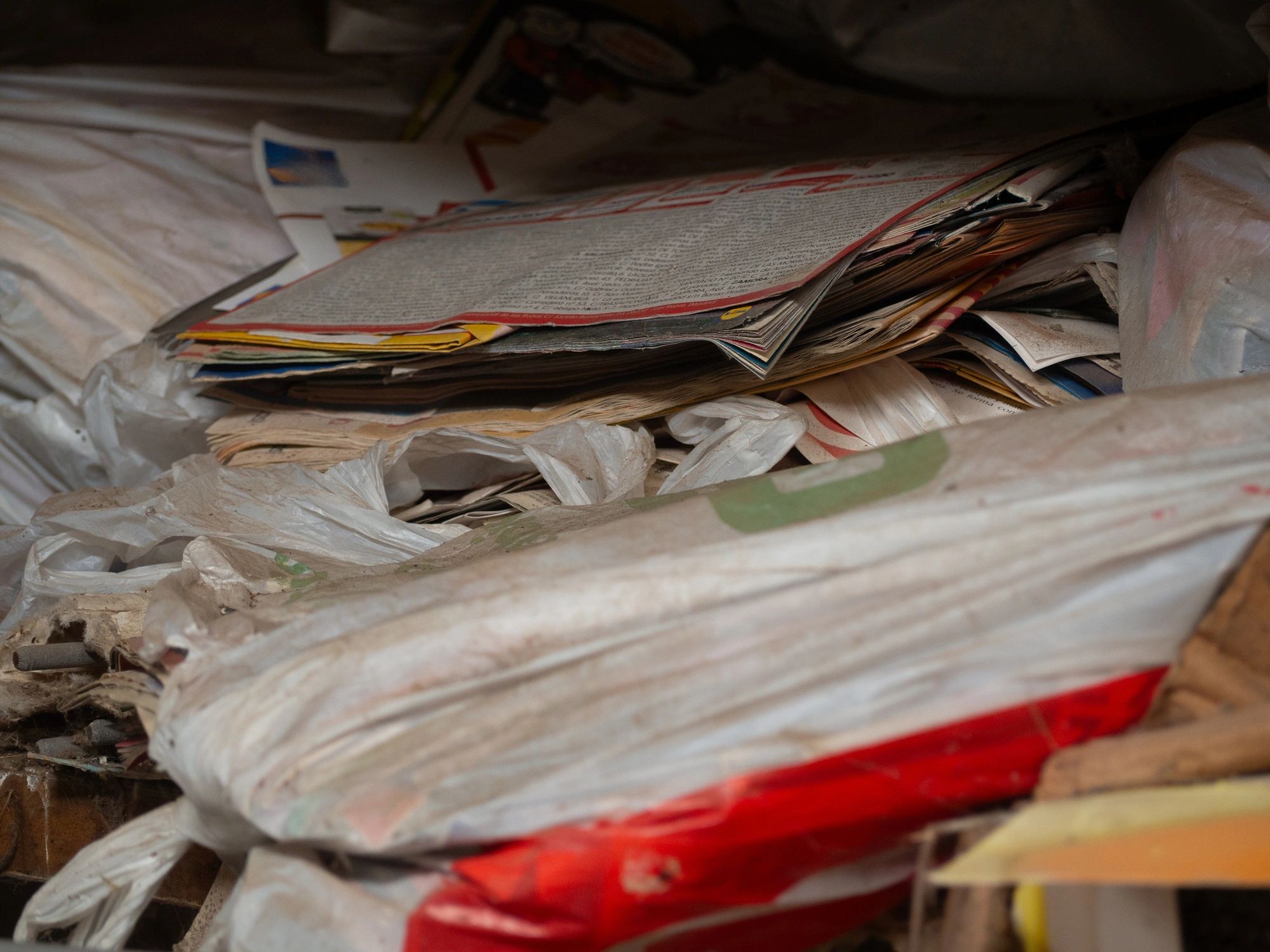 Newspapers and bags gathered for recycling