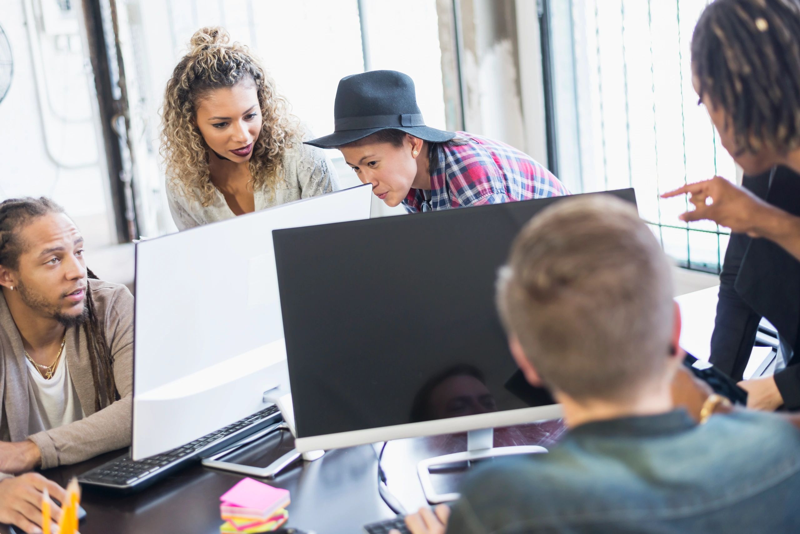 Team collaborating in a modern office meeting